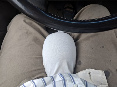 Stays warm driving, fits under loose pants too.
